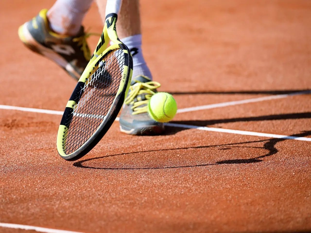 Tennishistorier og Tennisdialektik